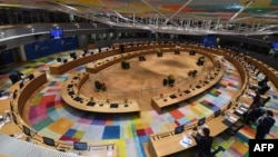 Leaders attend a roundtable meeting during a European Union summit at The European Council Building in Brussels, October, 21 2021. 
