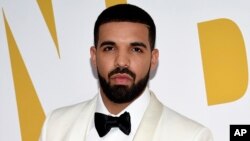 FILE - Canadian rapper Drake arrives at the NBA Awards in New York.