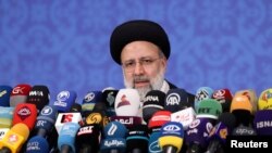 Iran's President-elect Ebrahim Raisi speaks during a news conference in Tehran, Iran June 21, 2021. Majid Asgaripour/WANA (West Asia News Agency) via REUTERS ATTENTION EDITORS - THIS IMAGE HAS BEEN SUPPLIED BY A THIRD PARTY.