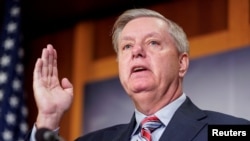 FILE - Chairman of the Senate Judiciary Committee Lindsey Graham (R-SC) speaks to the media after Special Counsel Robert Mueller found no evidence of collusion between U.S. President Donald Trump’s campaign and Russia in the 2016 election, March 25, 2019. 