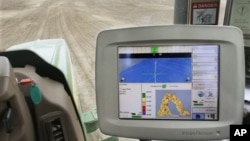 A GPS unit inside a tractor on a farm in Tallula, Illinois