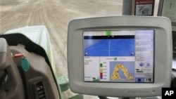 A GPS unit inside a tractor on a farm in Tallula, Illinois