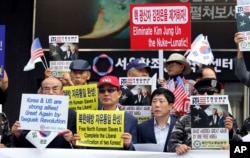 South Korean conservative activists and North Korean defectors hold a rally against North Korea and North's leader Kim Jong Un in downtown Seoul, South Korea, Sept. 8, 2017.
