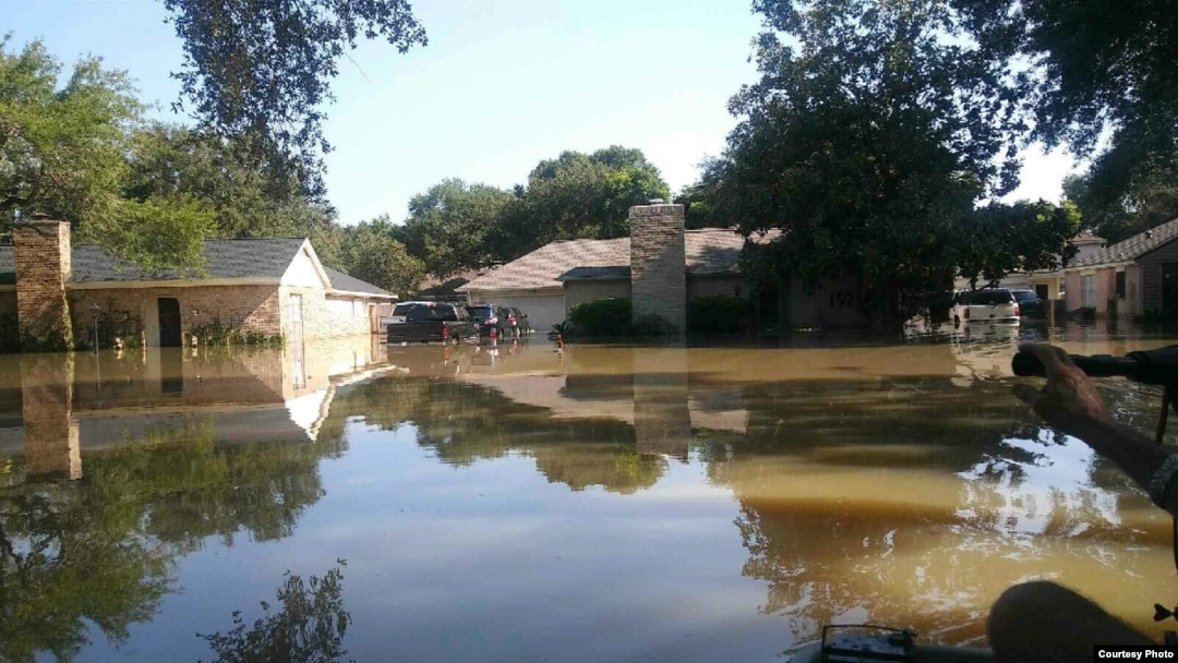 A street in Bear Creek Village is seen in this photo taken a week after Hurricane Harvey hit Texas in August 2017.