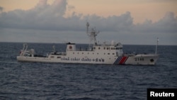 China Coast Guard vessel No. 2146 sails in the East China Sea near the disputed isles known as Senkaku isles in Japan and Diaoyu islands in China, in this handout photo, Aug. 8, 2013.