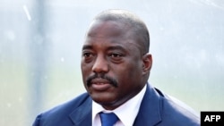 This file photo taken on February 3, 2015 shows the Democratic Republic of the Congo's President Joseph Kabila attending a training session of his country's football team in Bata.