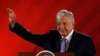 FILE - Mexico's President Andres Manuel Lopez Obrador gestures during his daily news conference at National Palace in Mexico City, Feb. 15, 2019.