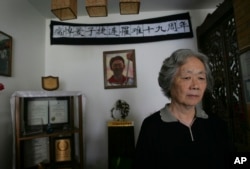 FILE - Ding Zilin, co-founder of the Tiananmen Mothers, a group representing families of those who died in the 1989 crackdown on pro-democracy demonstration, June 2008.