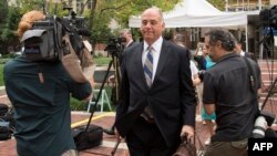 Paul Manafort's lawyer Thomas Zehnle (C) is surrounded by media as he arrives at the courthouse in Alexandria, Virginia, July 31, 2018.