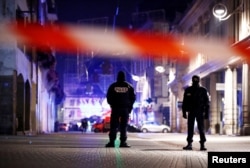 Police secure area where a suspect is sought after a shooting in Strasbourg, France, Dec. 12, 2018.