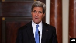 Secretary of State John Kerry speaks to reporters during his meeting with Ahmad al-Jarba, president of Syria's main opposition bloc, at the State Department in Washington, May 8, 2014. 