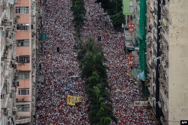 相关民众2019年6月9日举行声势浩大的反送中示威游行。