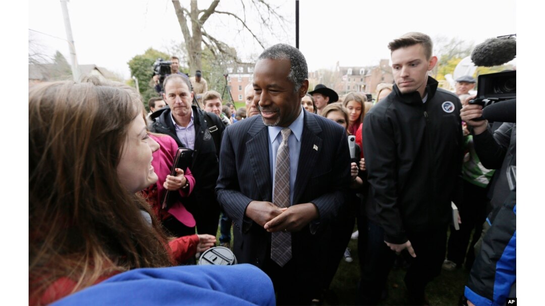 Republican presidential candidate Dr. Ben Carson greets audience members after speaking at Iowa State University in Ames, Iowa, Oct. 24, 2015.