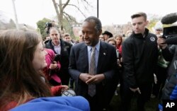 Republican presidential candidate Dr. Ben Carson greets audience members after speaking at Iowa State University in Ames, Iowa, Oct. 24, 2015.