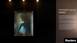 The painting entitled "Tutu," an artwork by late Nigerian artist Ben Enwonwu, is pictured at the Art X Lagos fair, in this handout picture obtained by Reuters, Nov. 5, 2018. 