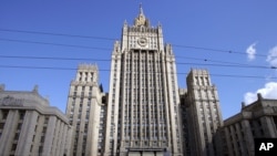 FILE: The main building of Russia's Foreign Ministry dominates the skyline in downtown Moscow, Wednesday, Aug. 16, 2006, with a Soviet Union state emblem on the facade. 