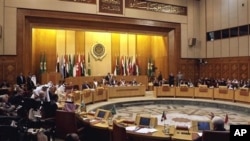 General view showing the Arab League's emergency meeting in Cairo, Egypt, where foreign ministers discussed the possibility of imposing a no-fly zone over Libya to protect the civilian population from the Gadhafi regime's fighter jets, March 12, 2011