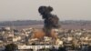 Smoke rises following an Israeli attack on Gaza City, Thursday, Nov. 15, 2012.