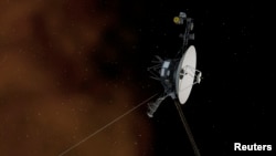 This undated artist's concept depicts NASA's Voyager 1 spacecraft entering interstellar space, or the space between stars. Voyager 1 spacecraft was officially the first human-made object to venture into interstellar space, according to a NASA statement.