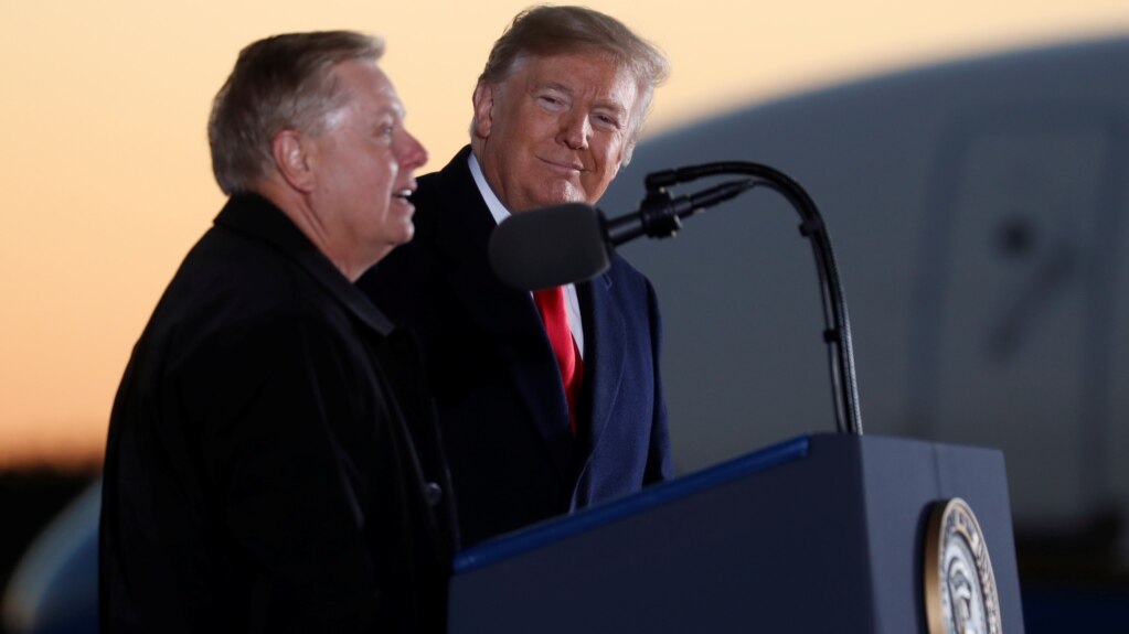 Tổng thống Donald Trump và Thượng nghị sĩ Lindsey Graham trong một sự kiện cuối năm 2018.