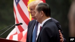 Ông Trần Đại Quang và Tổng thống Donald Trump ở Hà Nội tháng 11 năm ngoái.