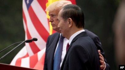 Ông Trần Đại Quang và Tổng thống Donald Trump ở Hà Nội tháng 11 năm ngoái.