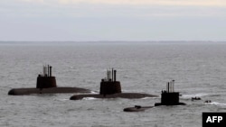 FILE - This photo released by Telam shows three submarines upon arrival to Mar del Plata's Navy Base, June 13, 2014. 