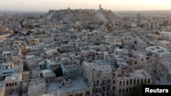 FILE - A general view taken with a drone shows Aleppo's historic citadel, controlled by forces loyal to Syria's President Bashar al-Assad, as seen from a rebel-held area of Aleppo, Syria. The Syrian regime and Russia are continuing their 'starve, get bombed or surrender' strategy in eastern Aleppo, says U.S. Ambassador to the U.N. Samantha Power.