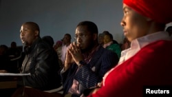 Mandla Mandela (L), grandson of former South African President Nelson Mandela, talks to journalists during a news conference in Mvezo in the Eastern Cape of South Africa, July 4, 2013.