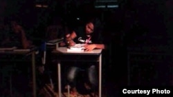 A Brazilian student is seen doing school work in a classroom without electricity. One of the Occupy Movement’s demands is improvement of classroom conditions in every public school. (Photo – courtesy of Rafael Galvao)