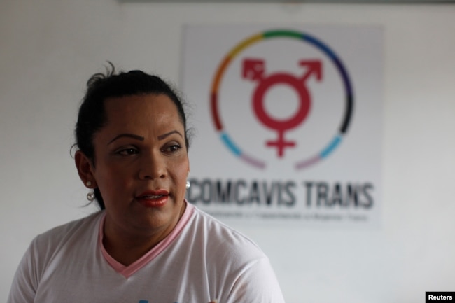 Karla Avelar, executive director of the Association for Communicating and Training Trans Women, poses for a picture at her office in San Salvador, El Salvador, May 12, 2017.