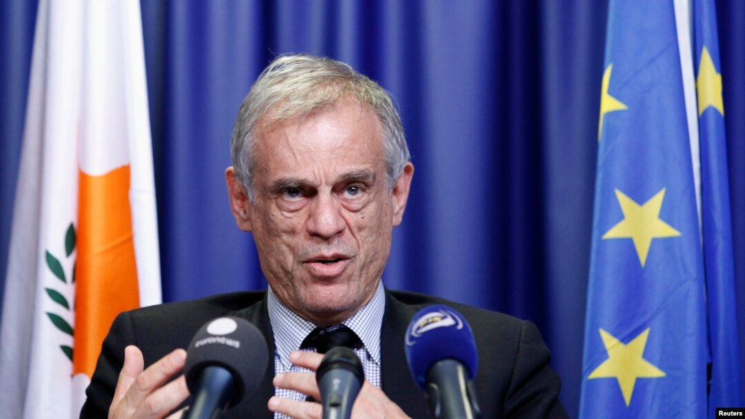 Cyprus' Finance Minister Michalis Sarris holds a news conference at the end of a Eurogroup meeting at the European Council building in Brussels, March 25, 2013.