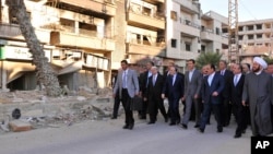 بشار الاسد امروز به "داریا" رفت؛ جایی که چندی پیش نیرو های حکومتی آن را از شورشیان تصرف کردند