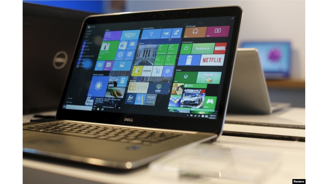 FILE - A laptop computer featuring Windows 10.