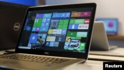 Sebuah komputer laptop yang menggunakan Windows 10 terlihat di konferensi Microsoft Build 2015 di San Francisco bulan April lalu.