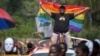 Ugandans take part in the 3rd Annual Lesbian, Gay, Bisexual and Transgender (LGBT) Pride celebrations in Entebbe, Uganda, Aug. 9, 2014. 