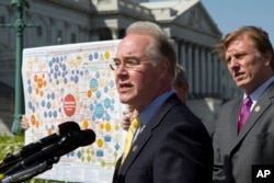 FILE - Rep. Tom Price, R-Ga., left, speaks during a news conference in Washington, March 26, 2012, to oppose the Affordable Care Act, often referred to as Obamacare.