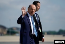 Secretary of Commerce Wilbur Ross boards Air Force One prior to departing Washington en route to Iowa from Joint Base Andrews, Maryland, July 26, 2018.