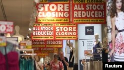Shoppers walk in a BHS store in London, July 25, 2016. The so-called Brexit means the city could lose its right to sell services tariff-free across the European Union, risking its position as Europe’s financial headquarters.