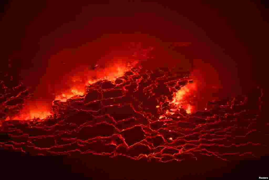 Lava is seen glowing inside the crater of the Nyiragongo volcano in the Virunga National Park near the eastern Congolese city of Goma in the Democratic Republic of Congo.