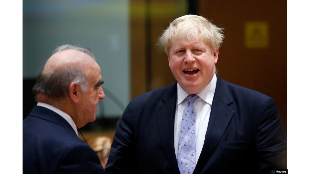 Britain's Foreign Secretary Boris Johnson talks to Malta's Foreign Minister George Vella, (left) during a European Union foreign ministers meeting in Brussels, Belgium, January 16, 2017.