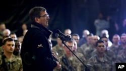 Defense Secretary Ashton Carter speaks with U.S. military personnel at Kandahar Airfield in Afghanistan, Feb. 22, 2015.