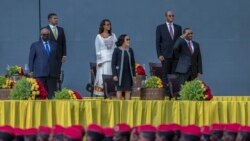 FILE: Ethiopia's PM Abiy Ahmed, right, First Lady Zinash Tayachew, center, and Djibouti's President Ismail Omar Guelleh, left, attend Abiy's inauguration ceremony after he was sworn in for a second term, in Addis Ababa, Ethiopia, Oct 4, 2021