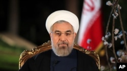 FILE - Iranian President Hassan Rouhani.