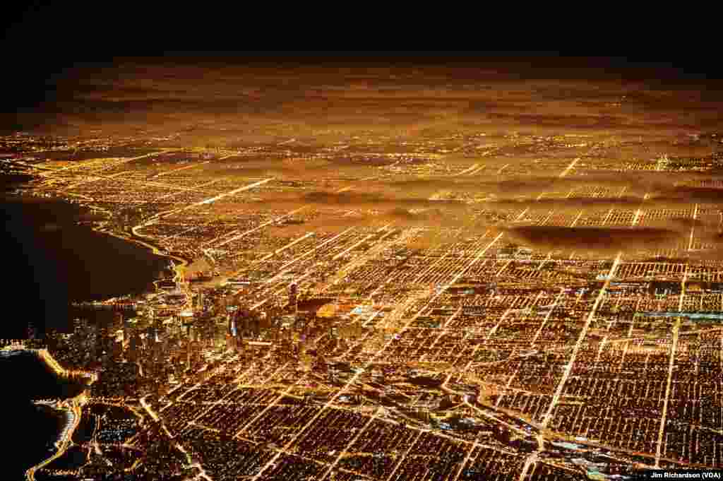 Chicago at night. In an average year the U.S. uses 120 terawatt-hours of energy, enough power to meet New York City’s total electricity needs for two years.
