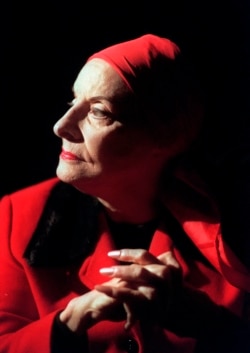 FILE - In this January 27, 1998, file photo, Alicia Alonso, founder of the Ballet Nacional de Cuba, listens during an interview in New York. (AP Photo/Bebeto Matthews, File)