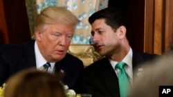 President Donald Trump talks with House Speaker Paul Ryan on Capitol Hill, March 16, 2017. Trump has told fellow Republicans to pass their health care bill Friday or the Affordable Care Act will stay in place.
