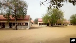 This image taken from video shows the exterior of Government Girls Science and Tech College in Dapchi, Yobe State, Nigeria, Feb. 22, 2018. 