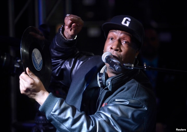 FILE - Hip-hop DJ Grandmaster Flash speaks at a ceremony where he is inducted into Guitar Center's RockWalk in Los Angeles, March 6, 2014.