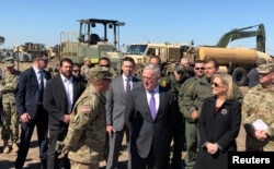 U.S. Defense Secretary Jim Mattis and U.S. Secretary of Homeland Security Kirstjen Nielsen tour Base Camp Donna in Donna, Texas, Nov. 14, 2018.